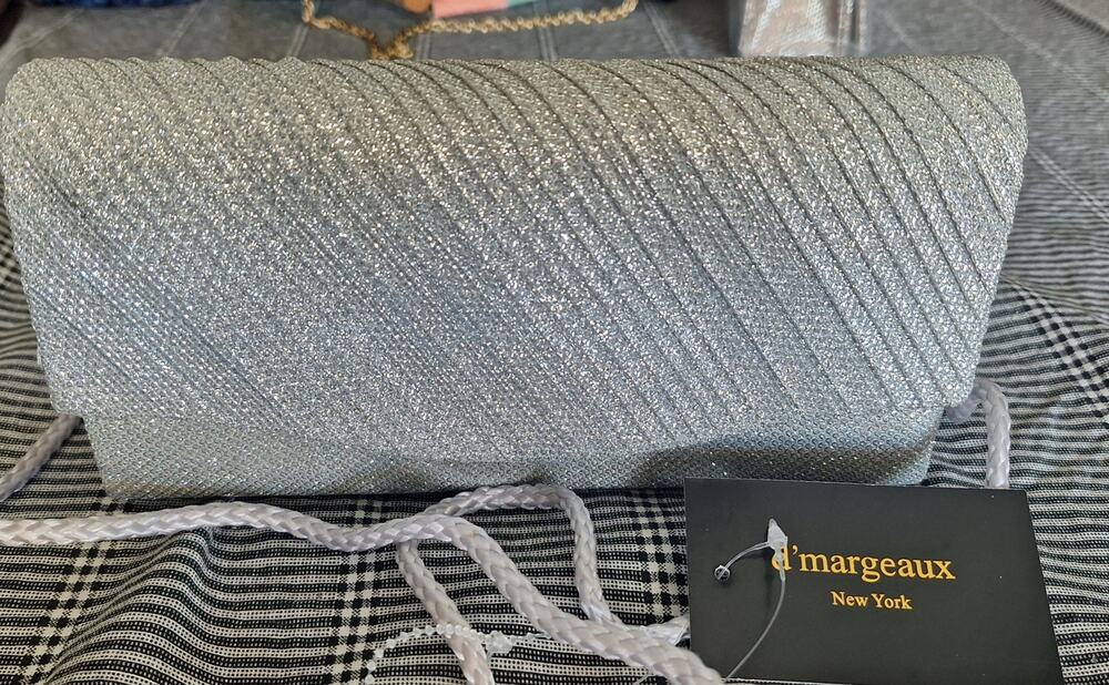d'margeaux brand clutch purse- silver metallic w/rope strap- 8"w x 4"h- NWT